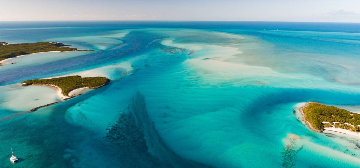 Sailing catamaran in the endless Exumas, Bahamas
